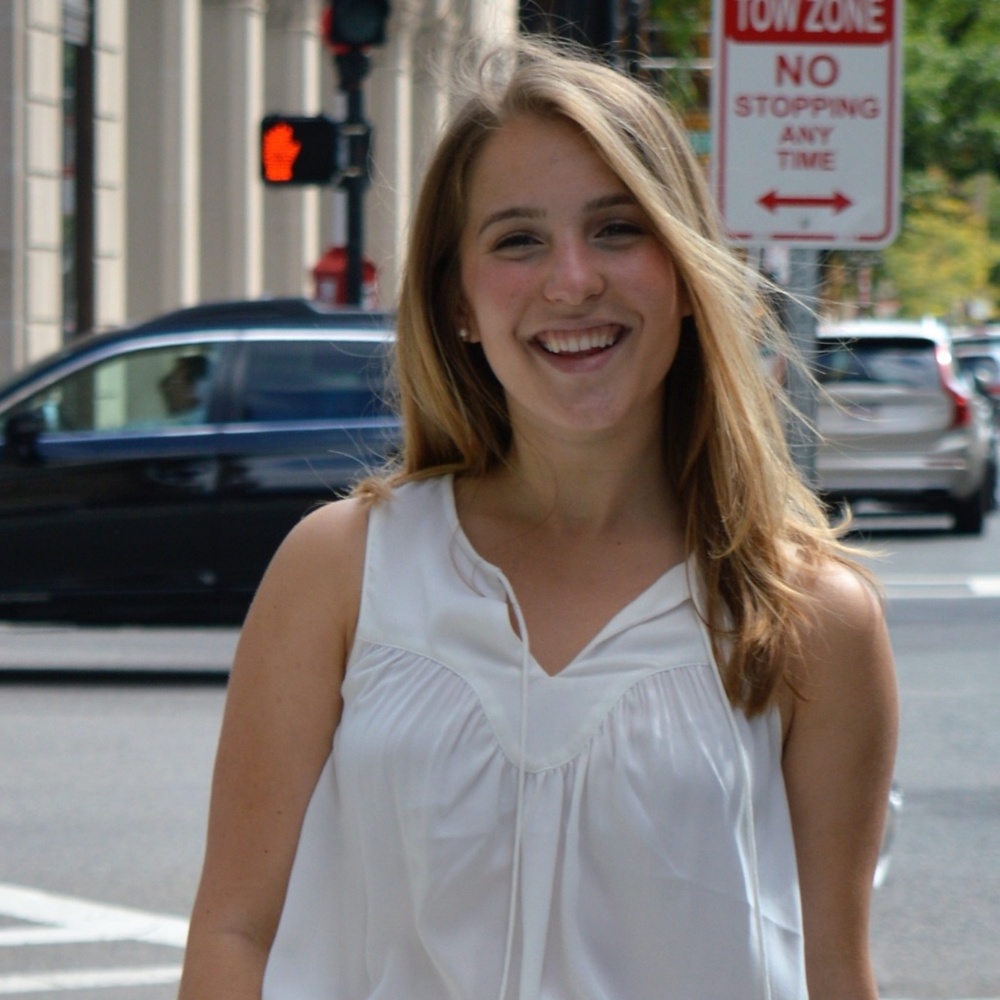 White flowy sleeveless blouse